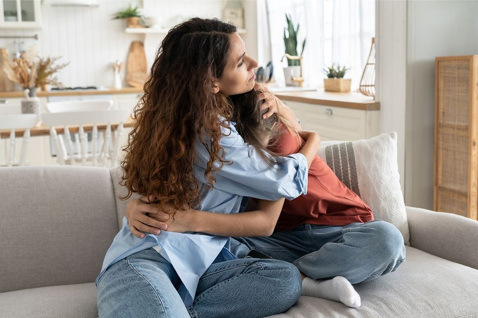 Parent supporting their child through emotional challenges.
