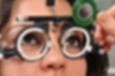 Female patient eye exam