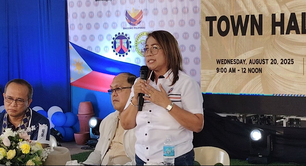 CdeO 1st District Engineer Ana Lee Manzano stresse a point during the town hall meeting Wednesday at Barangay Balulang. Beside Engineer Manzano are DPWH-10 Assistant Regional Director Sabeniano Caliao and Balulang Chairman Edwin Micabani.