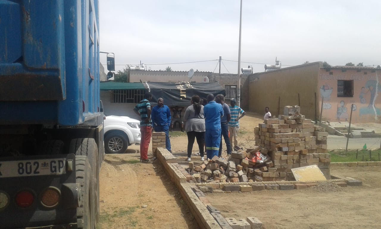 Hennops River Restoration and Clean Up Campaign - Discussions with dump truck driver