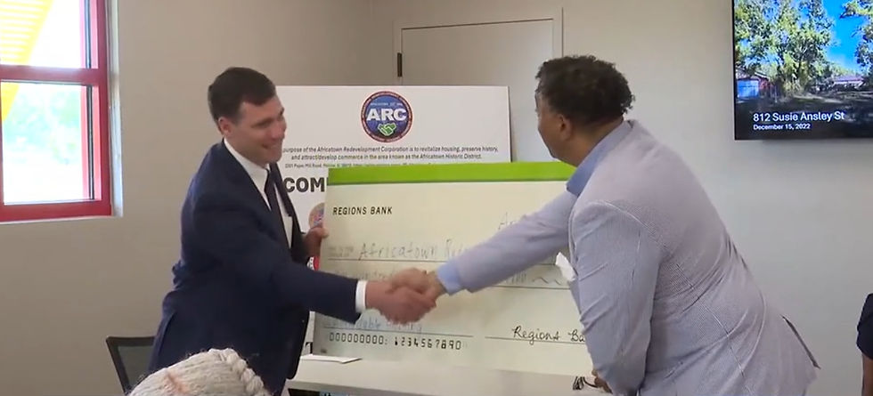 Africatown Redevelopment Corporation presented $100,000 check from Regions Bank