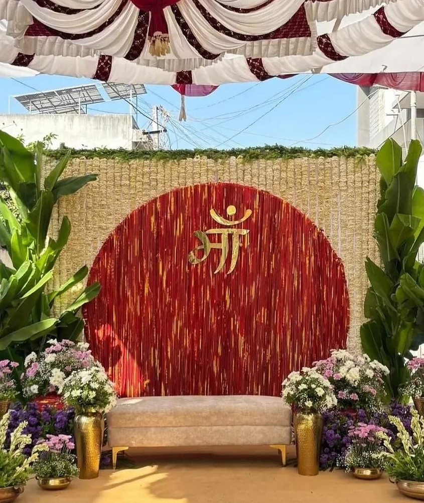 Stylish baby shower decoration with floral backdrop and premium event decor.