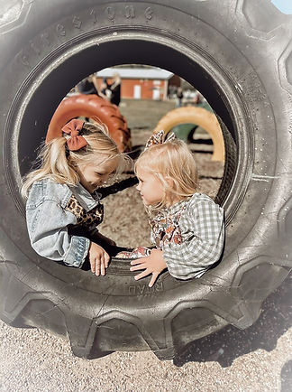 Girls in tire original _edited.jpg