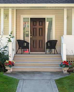 A picture of the front porch of a building. 