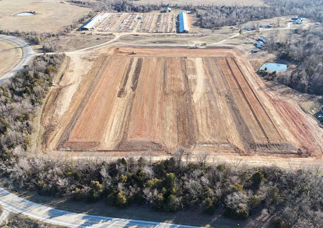 chicken barn pads by road