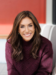 Woman smiling during a professional branding photography session