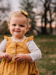 Toddler standing outdoors during a natural child photography session
