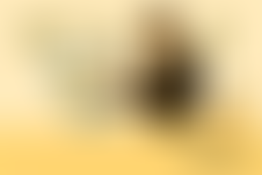 Flat-style illustration of an aviation safety officer using a magnifying glass to examine a checklist, with a box labeled “Voluntary Reports” and aviation icons in the background, symbolizing proactive hazard identification.