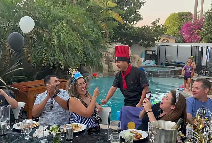 Jacksonville Beach FL hibachi at home private chef entertaining guests at poolside party