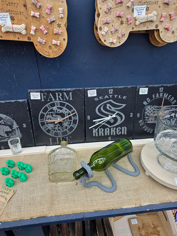 Various crafts and displays with visible text Farm, Kraken, SpellBound LaserCraft LLC.