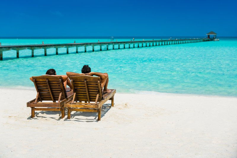 people relaxing on a beach