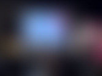 Five people speaking at a conference