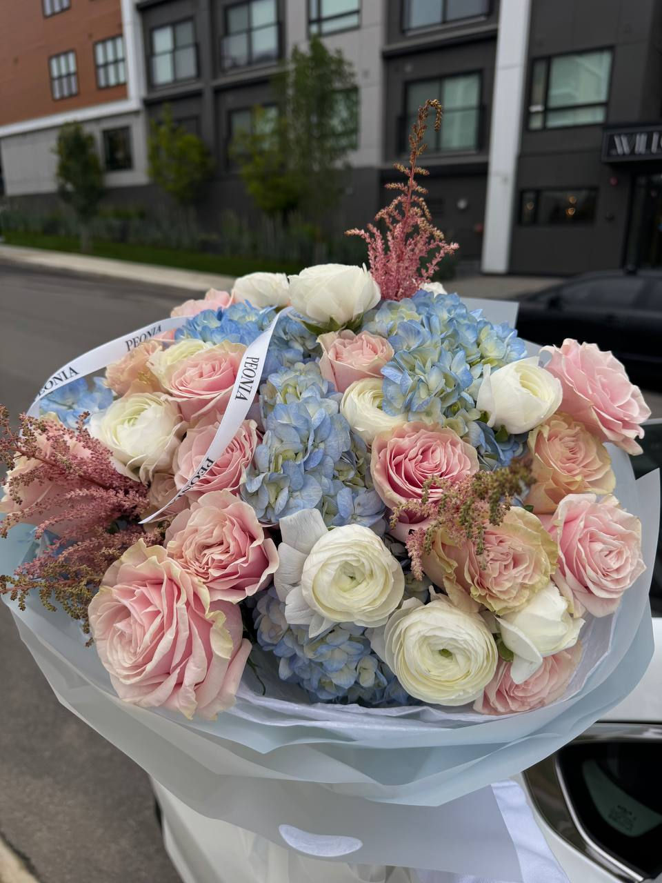 Blush pink and blue hydrangea bouquet