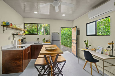 Open concept living and dining space in CASACLAUDIACR casita playa del coco Costa Rica