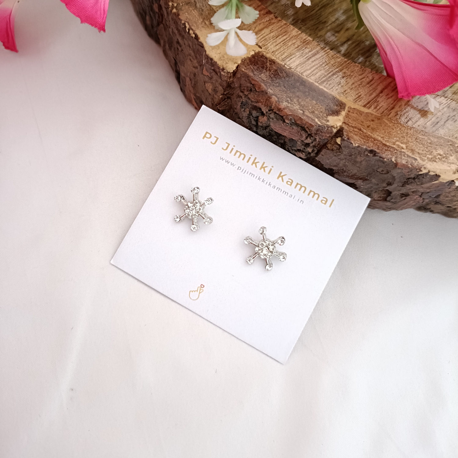 Pretty sterling silver snow stud earring