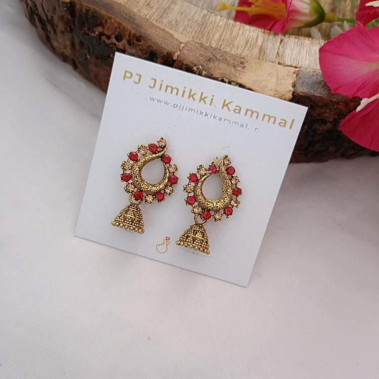 Thumbnail: Trendy Gold Jhumka With Stone Earring