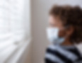 A-young-boy-looking-out-the-window-weari