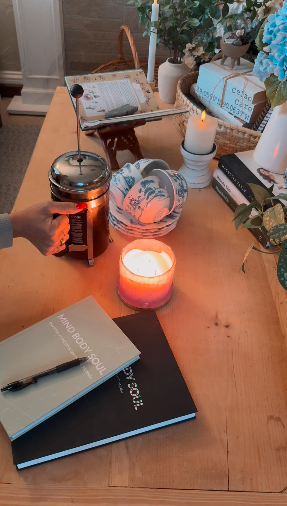 Eye-level view of a colorful planner open on a wooden table