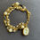 Thumbnail: Victoriana Intaglio Gold Charm Bracelet