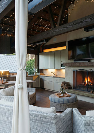 Pavilion seating area with timber posts and draped accents.