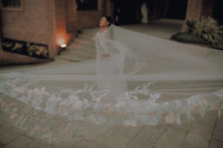 Cathedral train with pastel colored lace.