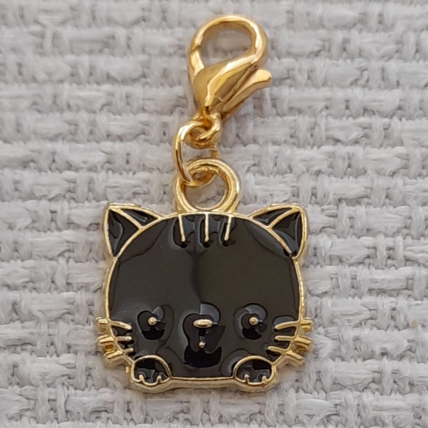Kitty face charm made into a progress keeper