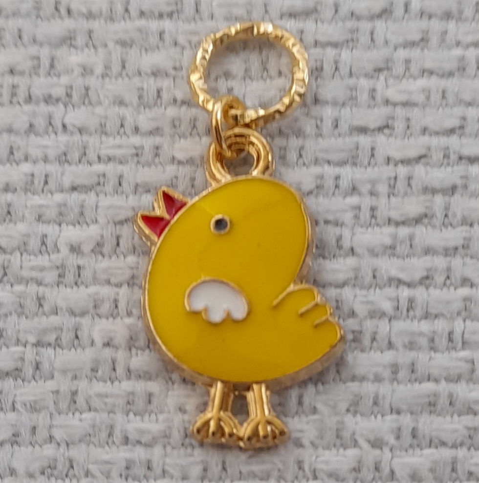 Yellow baby bird charm made into a stitch marker