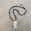Thumbnail: Mermaid Holding Dolphin and Beaded Abalone