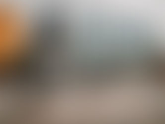 People riding an E-Bike in a city