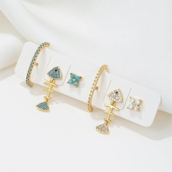 Thumbnail: Trío de zarcillos en dorado y azul con dorado