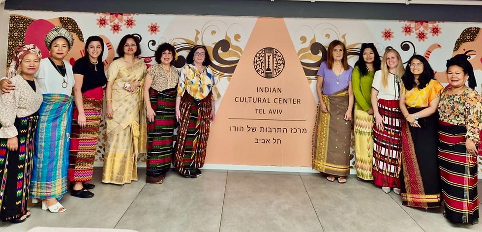 Ladies pose for a photo with traditional northeast Indian attires.