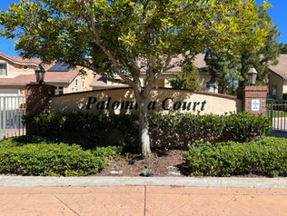 Stucco community sign with acrylic letters