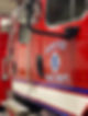 fire truck decals on red truck with blue and white reflective font