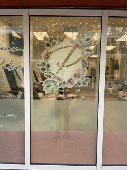 Window Stickers installed on a local nail salon