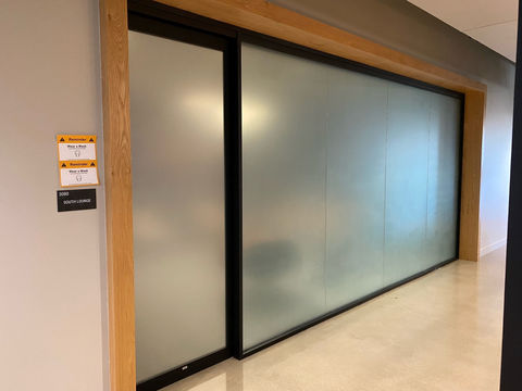 window and door frosting done on an office wall/window in el cajon by c.p. richards signs.