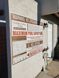 Pool capacity sign with max bather load – fabricated and installed in Carlsbad