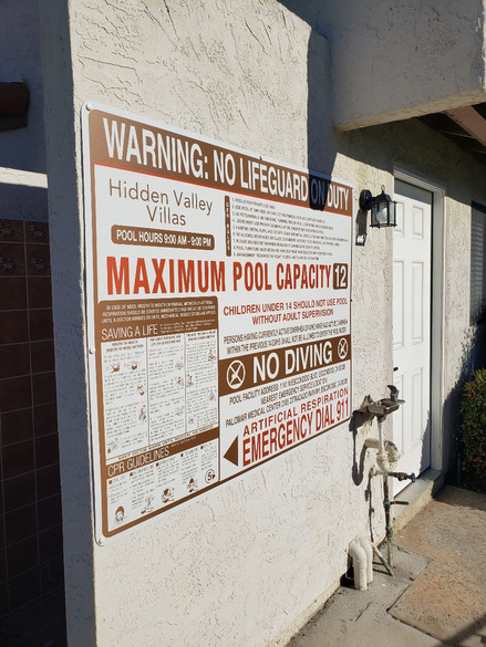 no lifeguard on duty pool sign