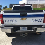 Blue and white truck wrap