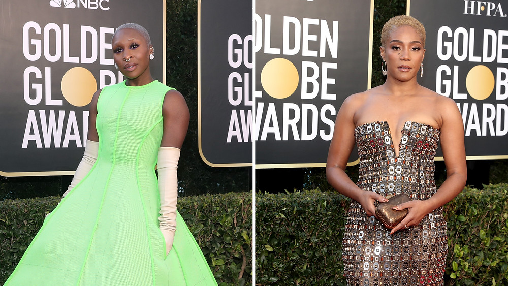 To left, Cynthia Ervo in neon green dress and long gloves. To right, Tiffandy Haddish in embellished, gold dress.