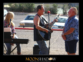 Bob taking Happy Birthday like a man