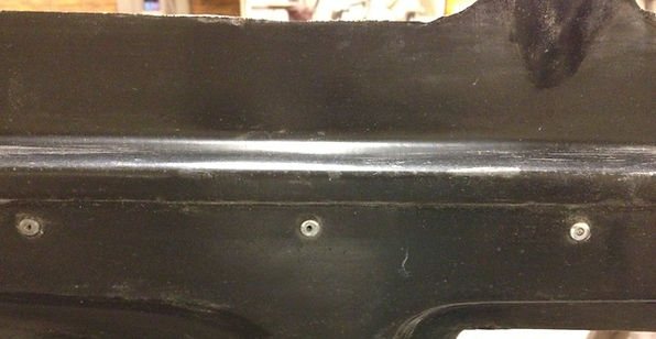 These rivets were installed by Creative Industries to hold the hinge brace in place