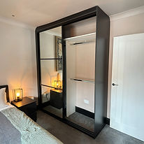Custom interior with shelve and hanging rails