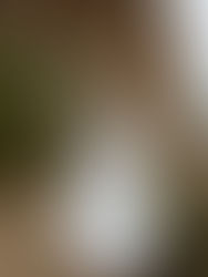 woman turning around in white dress 