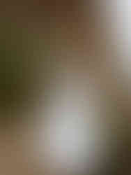 woman turning around in white dress