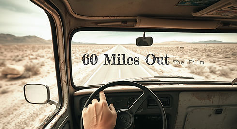 point of view from a drivers seat of an old pick up truck looking out at a long desolate r
