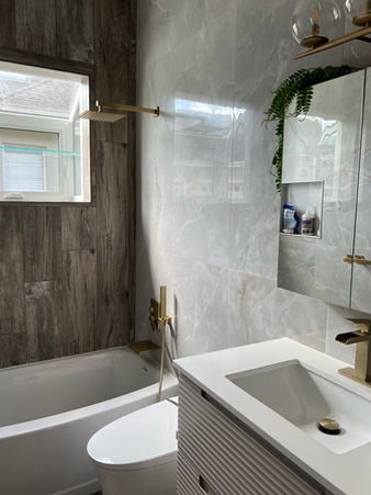 Walk-in shower remodel with tile on ceiling and modern tile design in Orlando