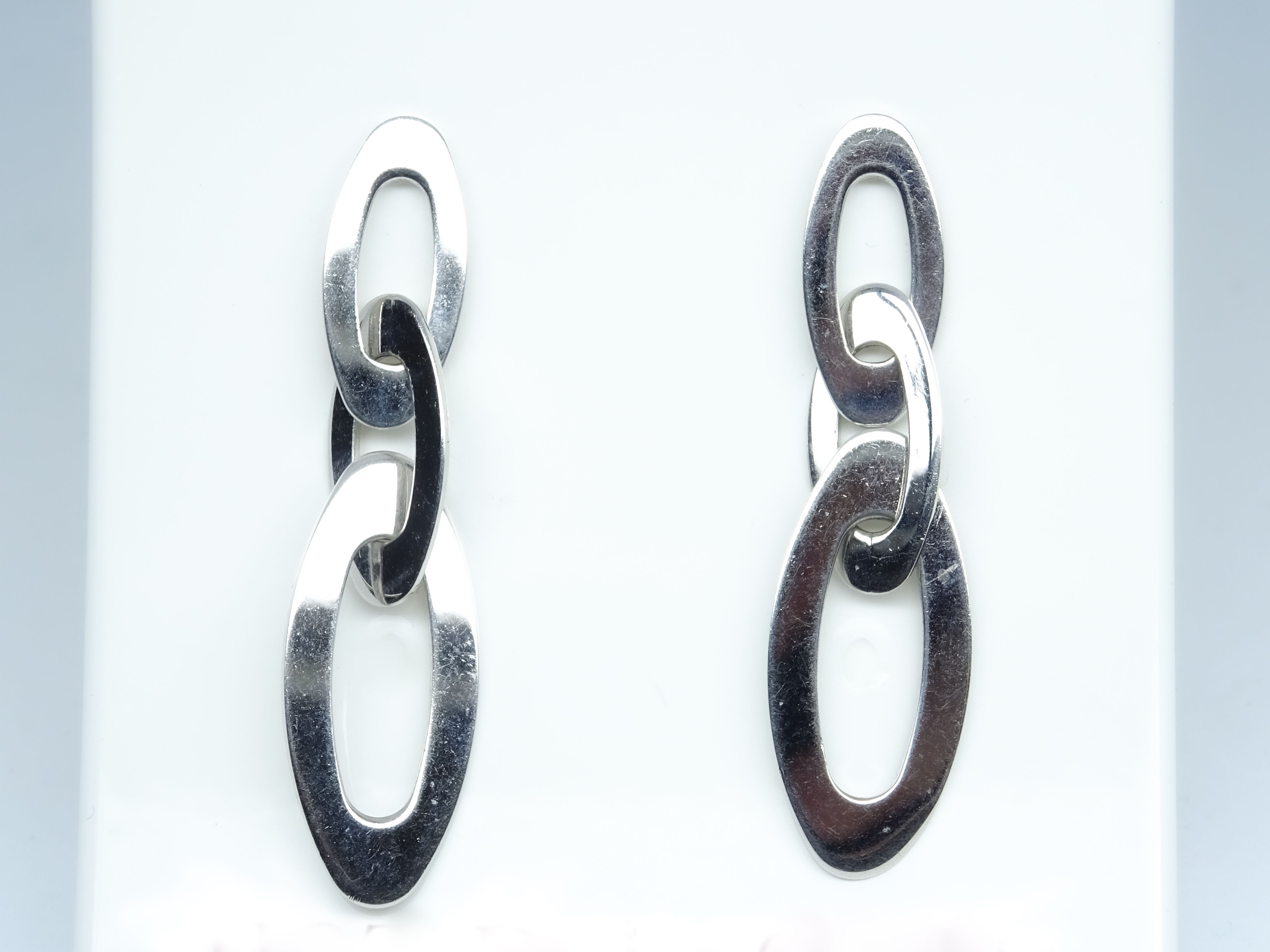 White gold oval link earrings