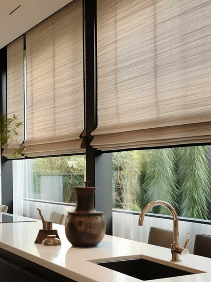 Custom woven wood shades installed in a Tulsa living room, adding natural texture, privacy, and light control to large windows