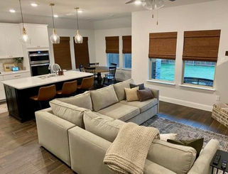 Motorized woven wood shades with light filtering liner add privacy and light control