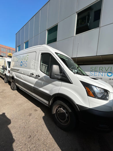 Commercial van fleet receiving scheduled mobile fleet washing services by SDFW.